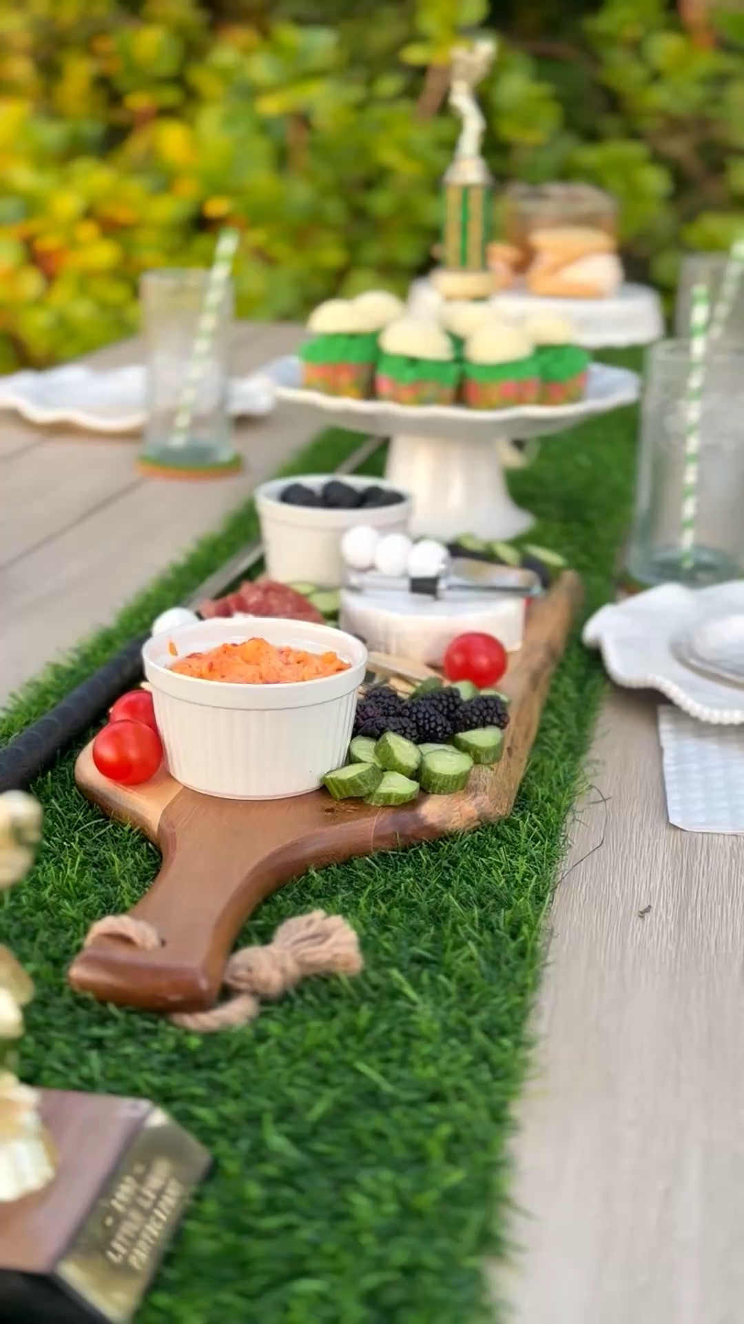 Masters golf tournament tablescape idea with classic pimiento cheese, Masters inspired peach ice cream sandwiches, golf ball cupcakes, my brother’s trophy, and my grandpa’s golf club. 💚⛳️

#LTKfoodie #LTKSeasonal #LTKHome