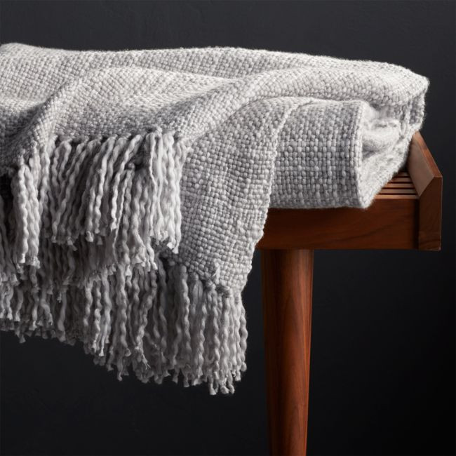 Styles Dove Fringe Throw Blanket | Crate & Barrel