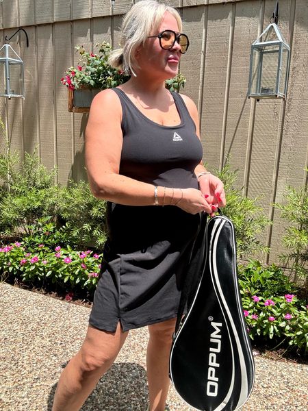 @walmart #walmartpartner Reebok tennis dress run generous, wearing a size large. Will order in a medium size 

Black tennis dress 

#LTKSeasonal #LTKMidsize #LTKOver40