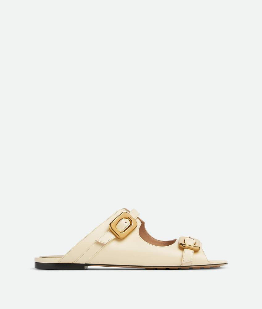Bottega Veneta® Women's Stretch Buckle Flat Mule in Sea salt. Shop online now. | Bottega Veneta