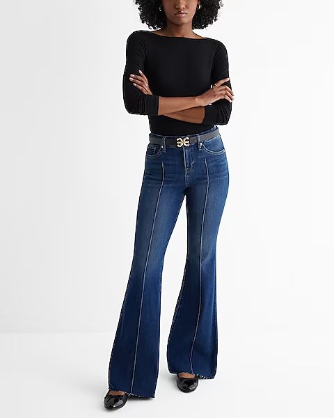 Mid Rise Medium Wash Pintuck Raw Hem FlexX '70s Flare Jeans | Express (Pmt Risk)