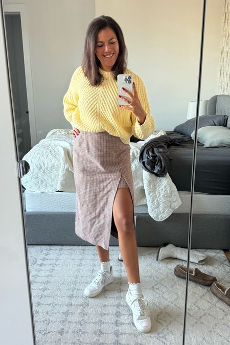 Cozy weekend brunch outfit with an edge! I love this Maje skirt with a high side slit (size 42, runs small) to show off some leg. I paired with a super chunky Vince sweater (size medium TTS), white Air Force one sneakers (size 11 TTS), and ruffle socks. 

Use code RTRALIJ for 30% off your first month of rent the runway. 

#LTKstyletip #LTKSeasonal #LTKmidsize