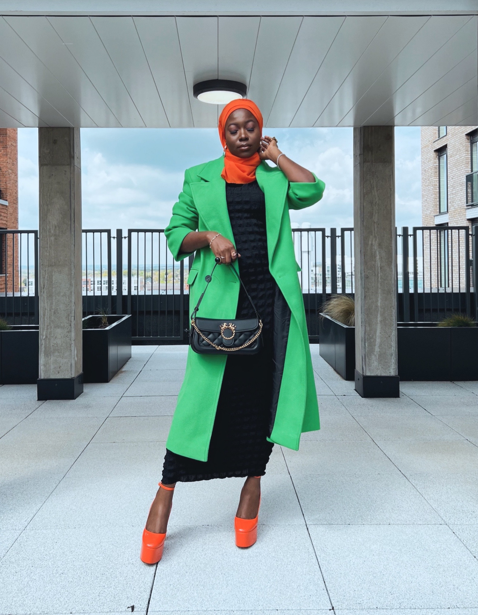 green dress orange heels Miss Lola main image 0