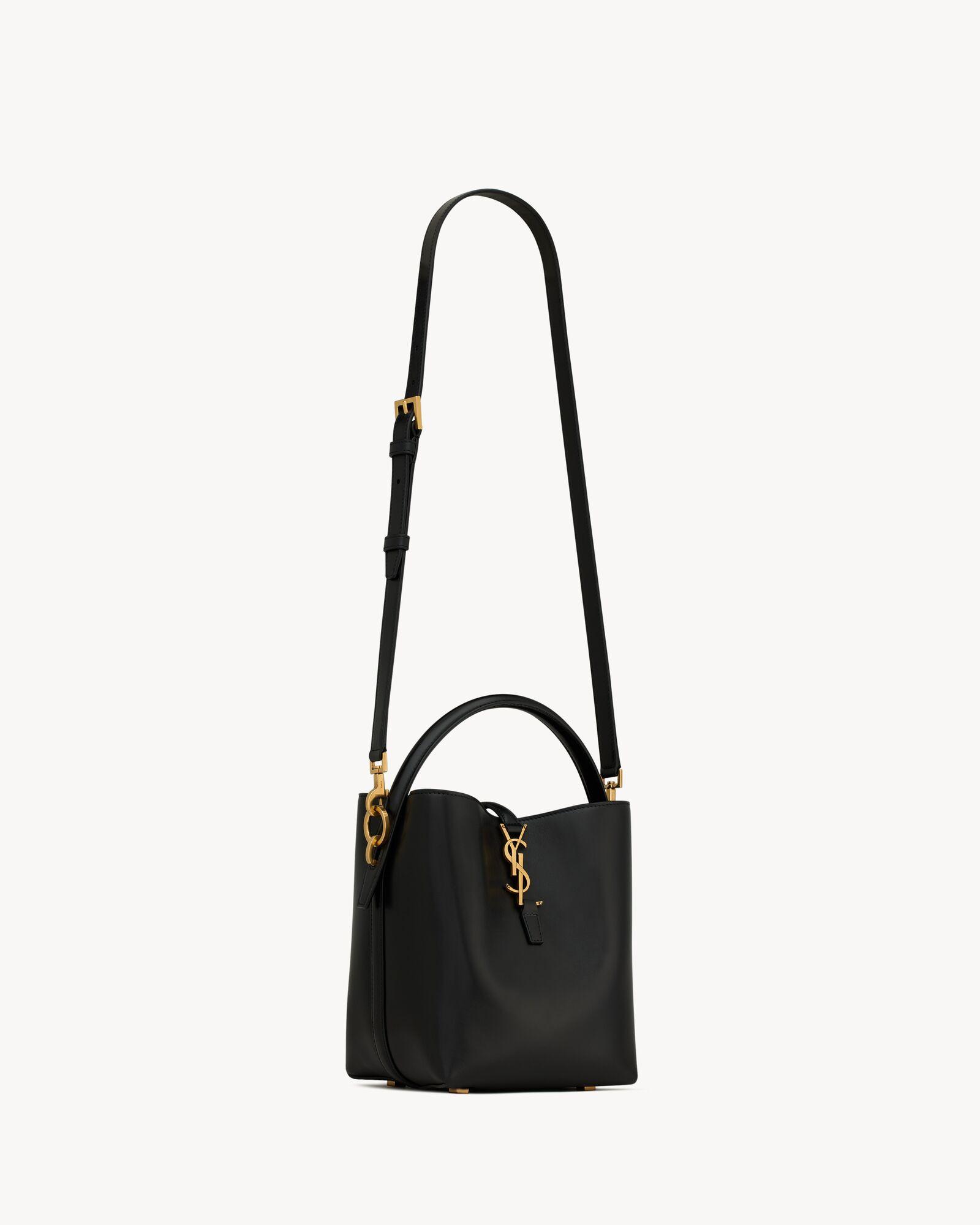 Bucket bag featuring the CASSANDRE hook closure, top handle and an adjustable and detachable shou... | Saint Laurent Inc. (Global)