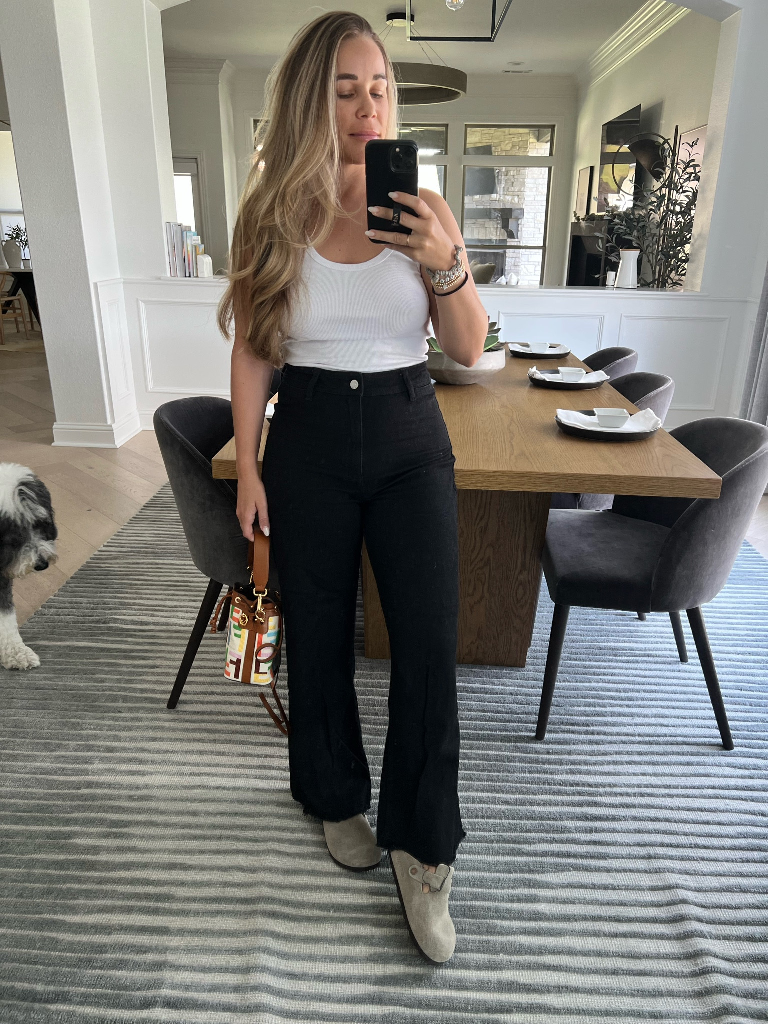 Casual outfit. Amazon. Black wide leg jeans. White tank. Birkenstock  