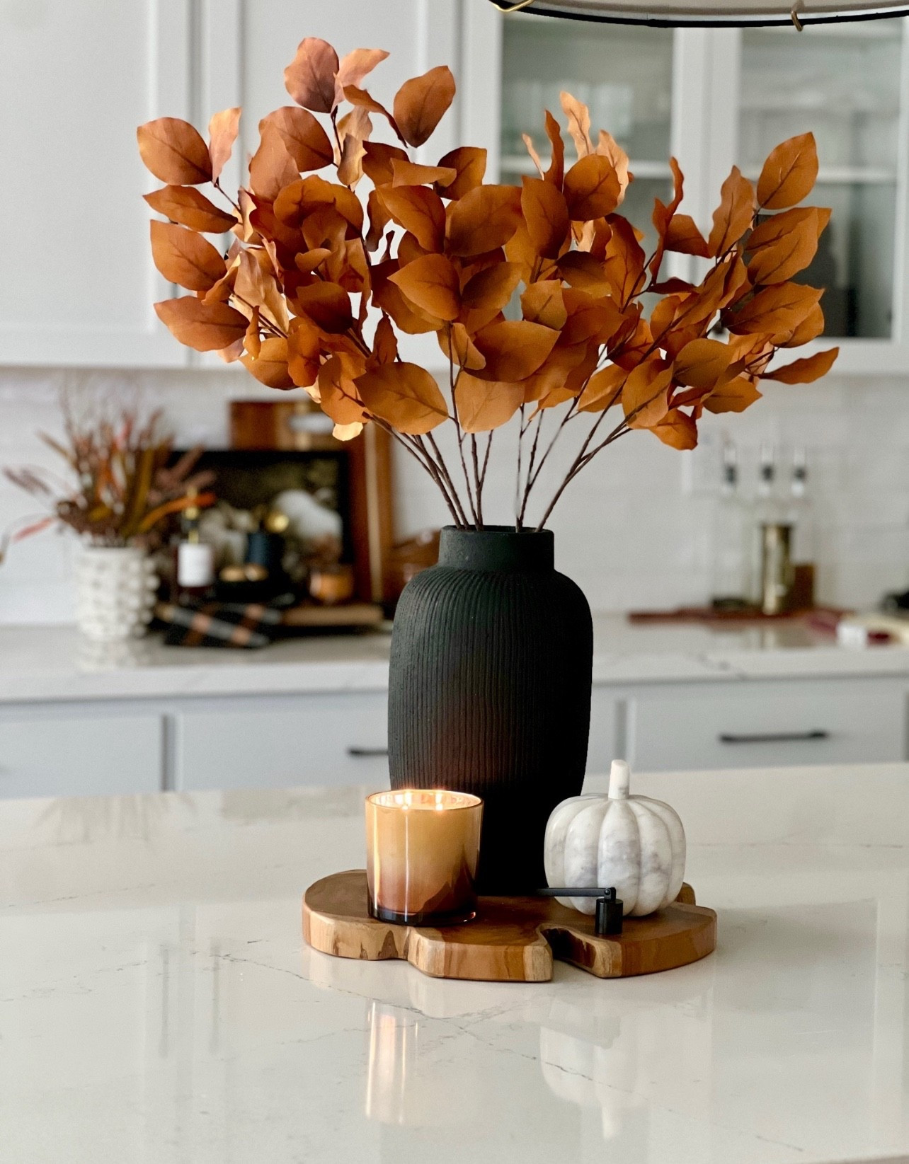 Fall vase decor for the kitchen island! Black ribbed vase, wood wedge, fall kitchen decor, fall candle, fall, pumpkin decor, glass pumpkin

#LTKSeasonal #LTKHome