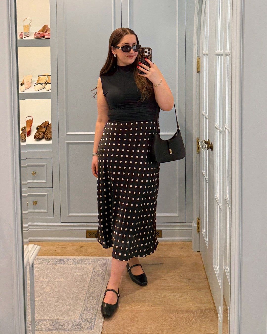 Polka dot outfit / spring outfit / midi skirt + black top / black outfit / workwear / office / midsize 

Sizing: L in skirt, top & shaper

#LTKsummer #LTKworkwear #LTKmidsize