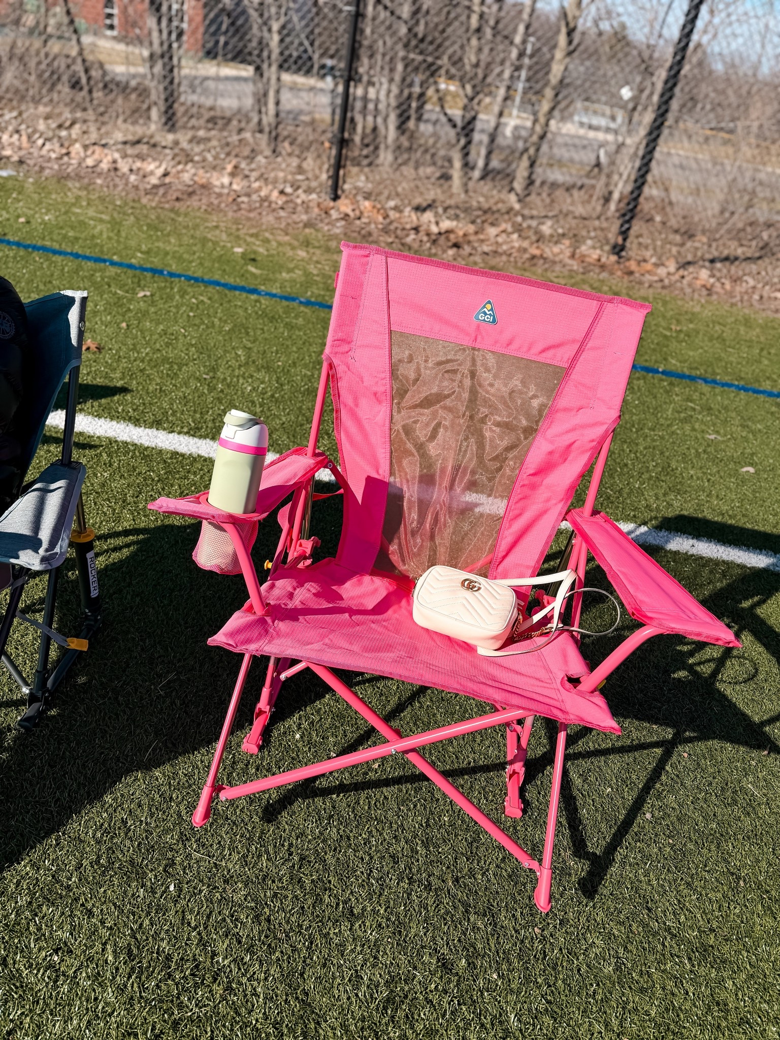 GCi outdoor kickback rocker chair for soccer mom and sports moms outside on the sidelines 
