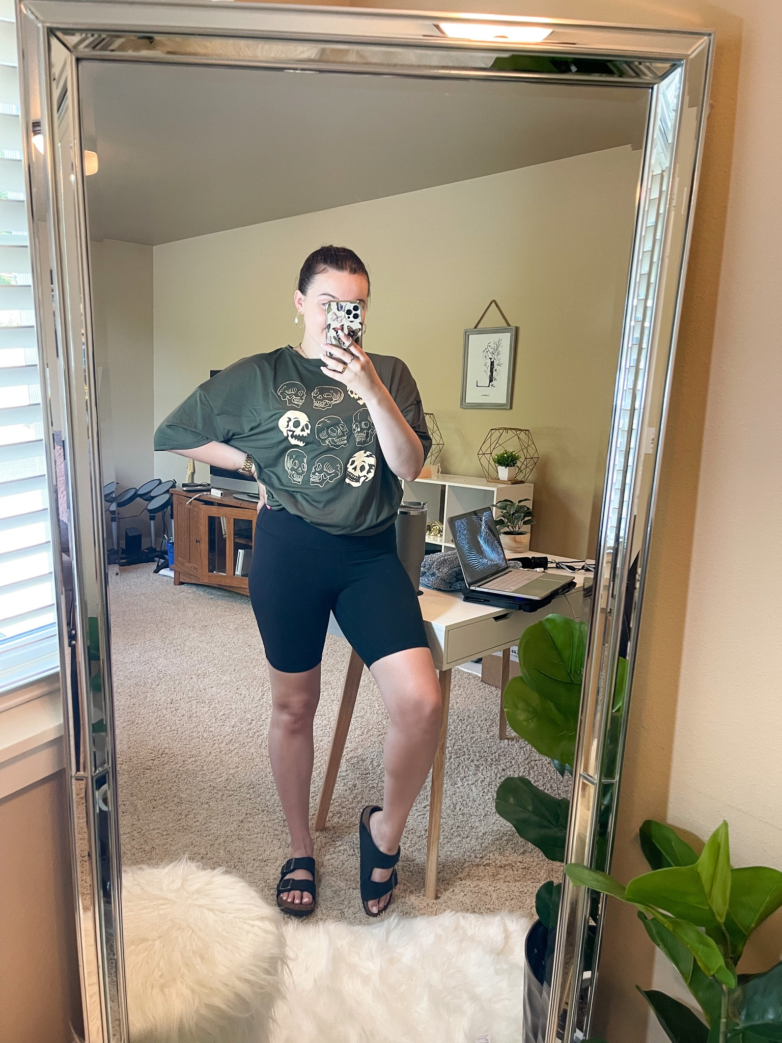 Casual graphic tee outfit for fall! Featuring a soft Skelton tee 

I’m wearing a L tee, size 8 shorts and size 9 sandals 

#LTKstyletip #LTKSeasonal #LTKunder100