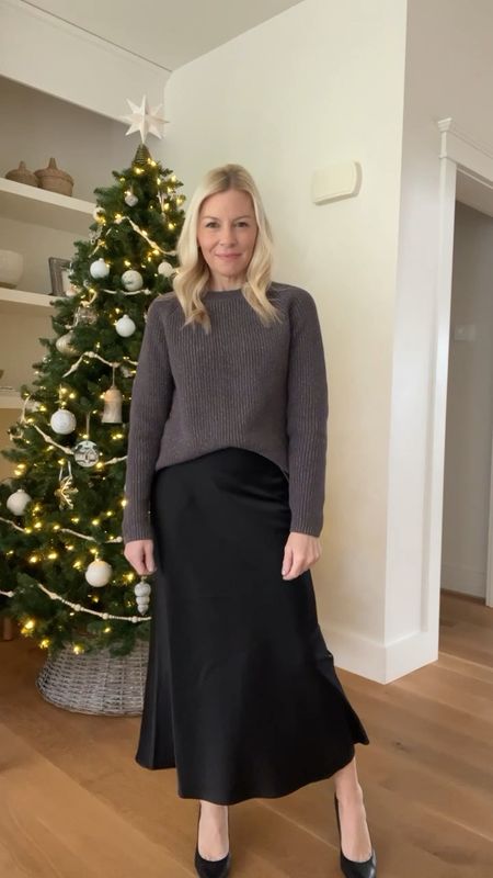 Feeling festive is this metallic gray sweater🎄

Paired it with a black satin skirt for an elevated look! 

Save 40% now with my code MICHELE40

#LTKover40 #LTKparties #LTKHoliday