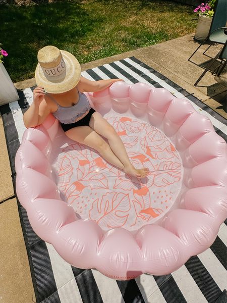Turned our back patio into a little private oasis this week ☀️🌴 My husband potted some palms, blew up my new tufted PINK pool from @minnidip & I sunned all day today!💦 My inflatable pool (yes, it’s for adults!😎) was under $60 & comfortably fits 2-3 people at a time! We grabbed these black & white striped patio mats, too which I think really set off the whole look!😍 Everything is linked here, including my pool in other colors✨💦

#LTKfamily #LTKhome #LTKswim