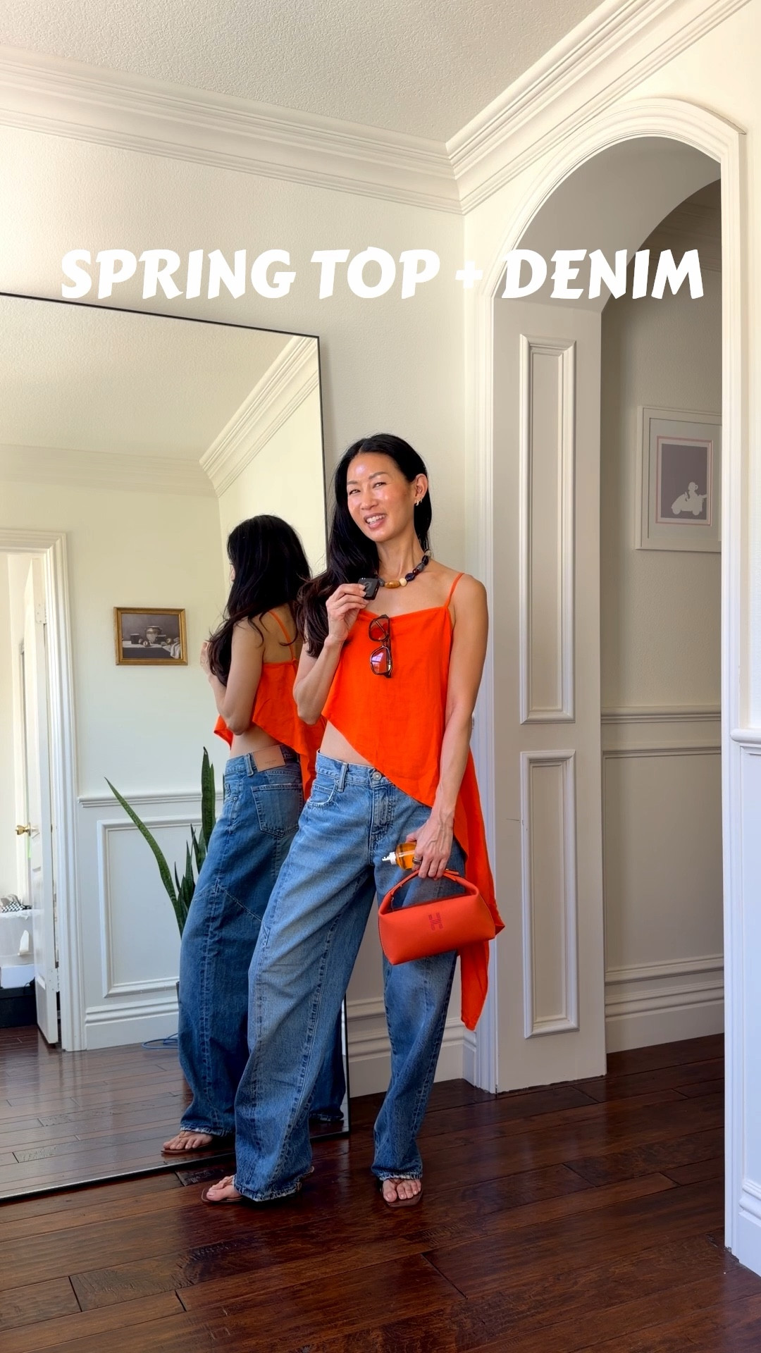 Spring top and denim outfit inspiration. Love the asymmetrical hem of this top and the back is too cute. Wearing xs in top and 24 in jeans (sized up for a baggier fit). Paired with the perfect spring/ summer fragrance! 

#LTKootd #LTKPetite #LTKTravel