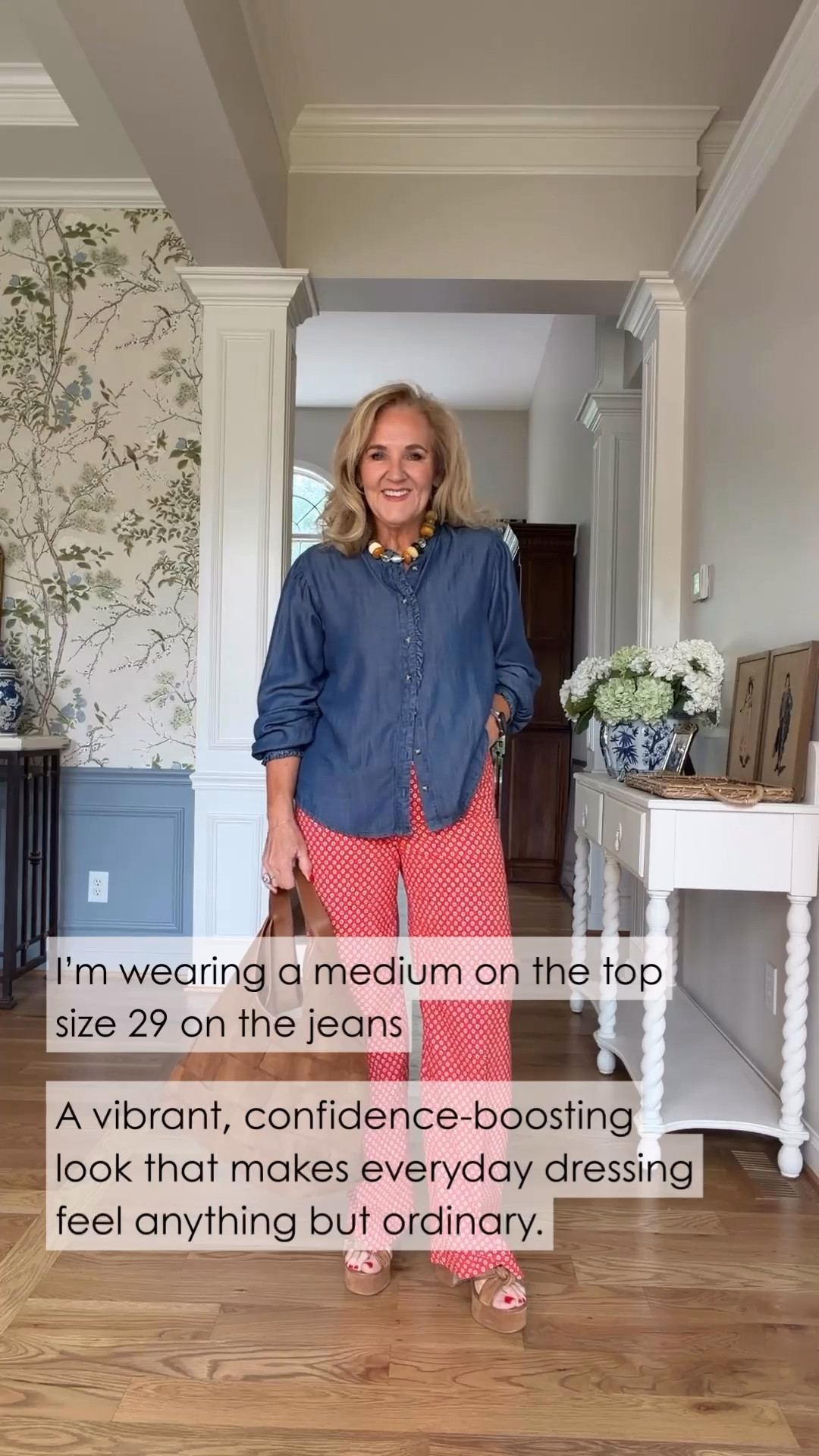This denim button-front top is such a great balance for these bold coral patterned pants. The relaxed fit keeps the look comfortable, while the colorful wide-leg pants add personality and make the whole outfit feel pulled together.

💡 LTK MADE EASY
❤️ Heart = Support my posts!
🔖 Save = Get sale & restock alerts
📋 Lists = Keep favorites organized
📲 Share = Send lists and products to a friend. Hello, Christmas List!
💬 Comment = Ask me anything about what I'm wearing.:-)

#LTKootd #LTKTravel #LTKOver40