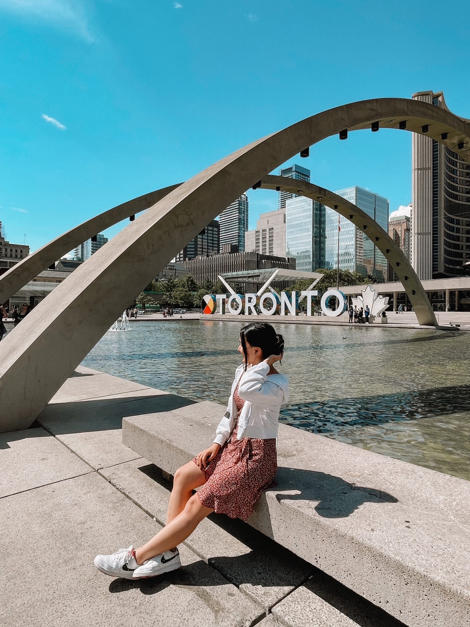 Fun and cute casual outfit for a day out traveling! Styled a pink reddish floral dress with a cropped drawstring white jacket. Paired it with Nikes I got from Nordstrom 

#LTKSeasonal #LTKtravel #LTKstyletip