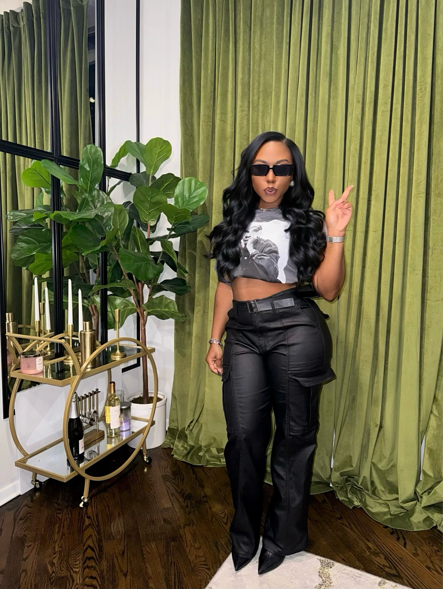 I love dressing up a graphic tee and styling it as a crop top by simply tucking the tee into my bra. Pair this Tupac tee with cargos, heels or sneakers for a laid-back yet edgy vibe. The perfect look for a night out or a concert 🖤 

5’3 | 160 lbs | Medium Top | Large Cargos

#targetfinds #fashionblogger #LTKxWayDay 

#LTKfindsunder50 #LTKstyletip #LTKhome