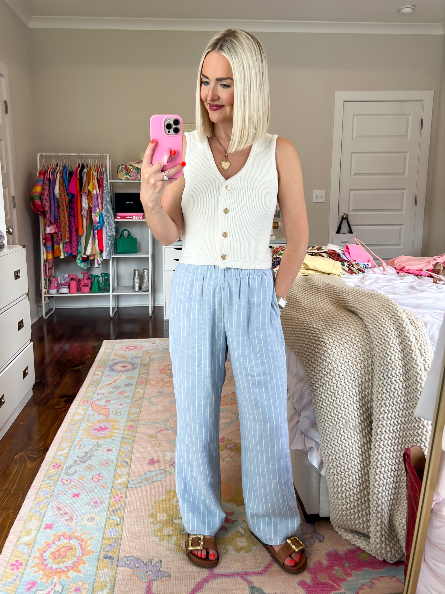20% OFF 
White sweater tank (XS, wish I did SM) / blue striped pants (XS short, wish I did regular) / linen blend pull on pant 

#LTKSeasonal #LTKSummerSales