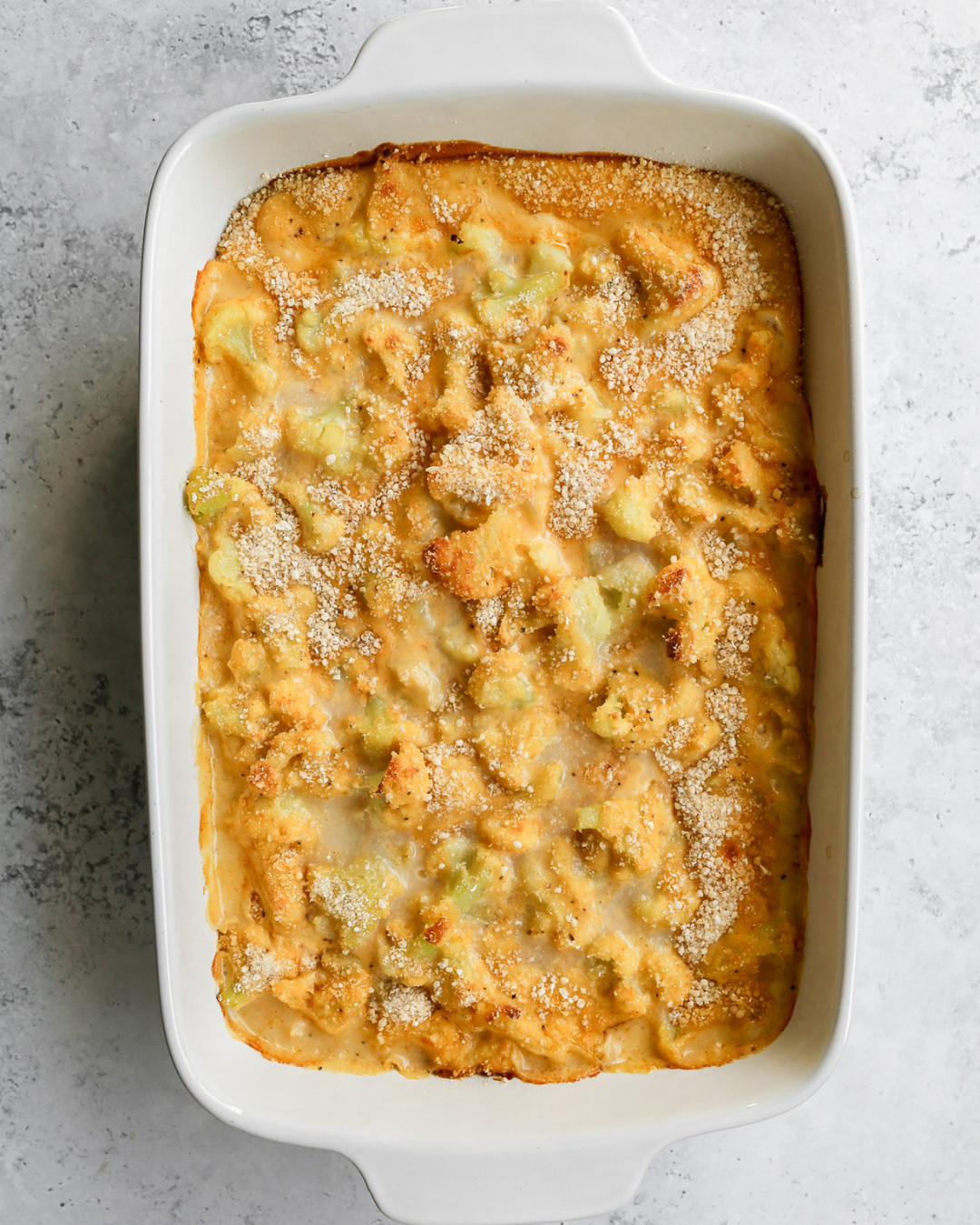 This Cheesy Cauliflower Casserole is the kind of comfort food side dish that makes everyone ask for the recipe. Tender cauliflower smothered in a rich homemade cheddar cheese sauce with a crispy gluten free bread crumb topping, baked until golden and bubbly. It is completely gluten free and so easy to pull together with pantry staples. Linking the baking dish, 2-quart saucepan, and box grater I use for recipes like this! 

 #LTKdayinmylife #LTKfoodie #LTKHome