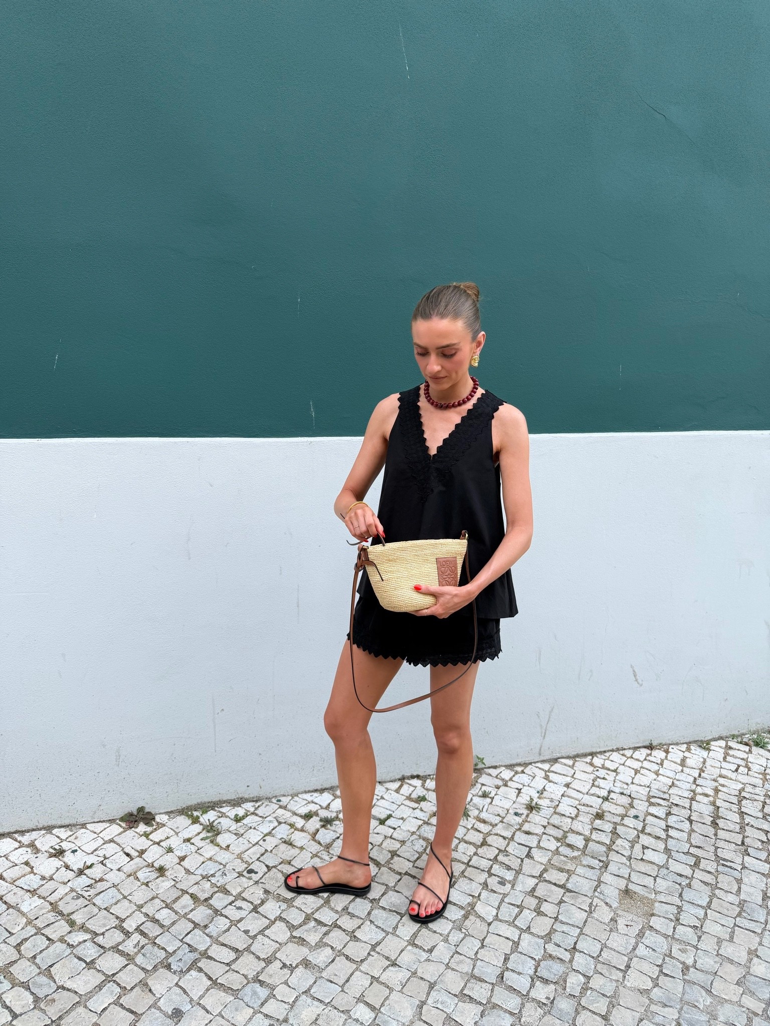 Holiday evening outfit 
UK 6 in the DISSH top and shorts
Added similar to get the look 
Loewe raffia boa
Ancient Greek Sandals
& other stories gold shell earrings 
& Other stories red beaded necklace _sold out I think so linked similar