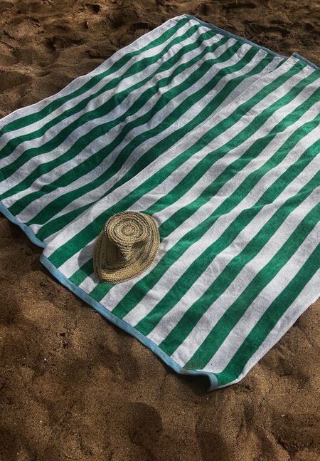 Stripes beach towels and woven bucket hat 

#LTKswim #LTKSeasonal #LTKunder50