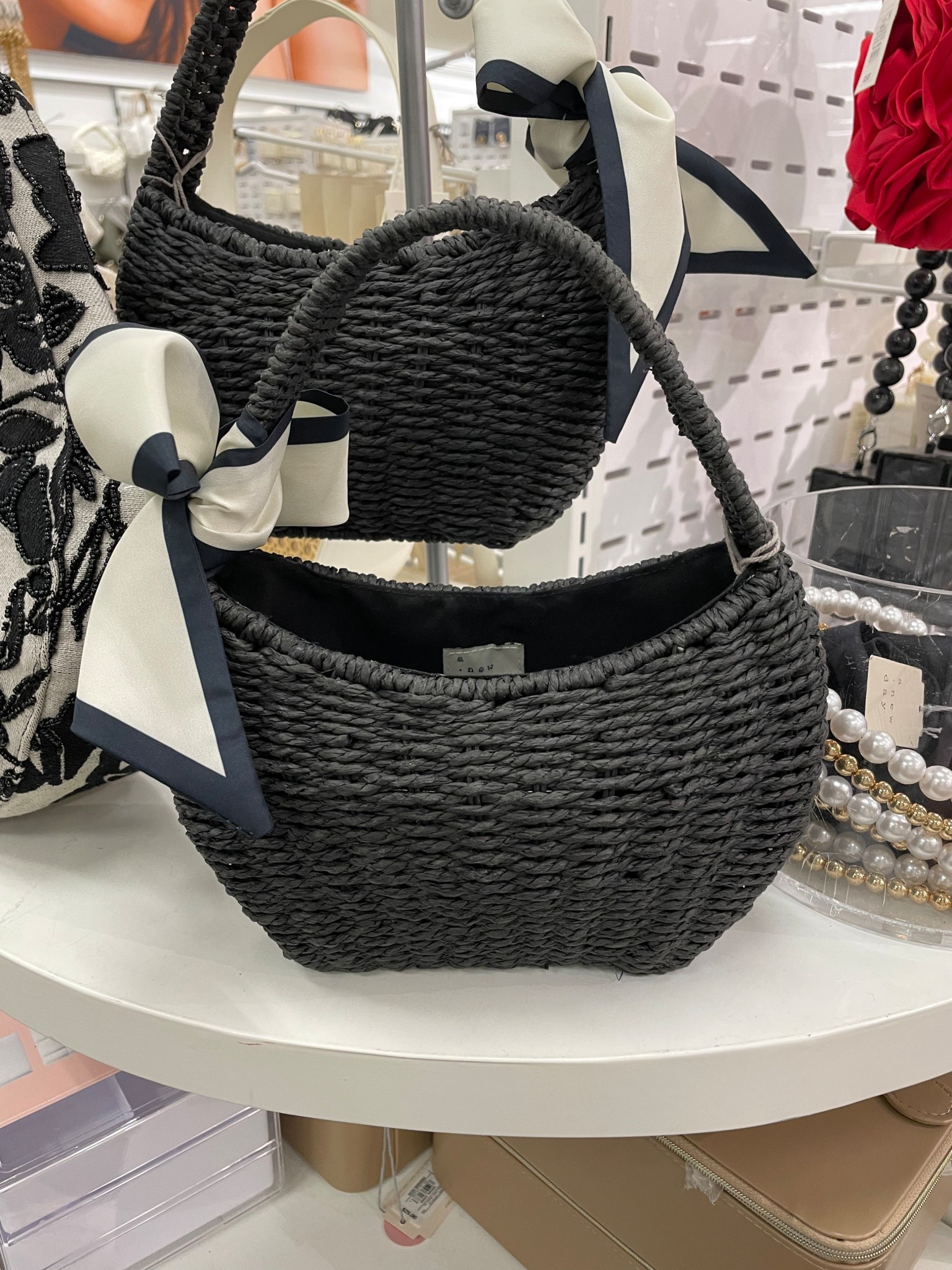 LOVE this woven black raffia bag for summer 😍 perfect size for your essentials! 

Target finds 

#LTKItBag #LTKFindsUnder50 #LTKStyleTip