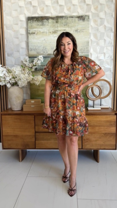 @anthropologie Fall floral mini dress 🍂 Rust orange floral print short-sleeve mini dress with a smocked waist and flowy tiered skirt, styled with a brown mini bag and burgundy strappy heels. A pretty date-night and fall wedding guest dress in warm autumn tones.

Sizing: true to size, large

#LTKSeasonal #LTKOver40 #LTKMidsize