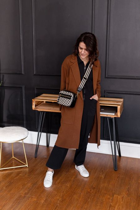 Perfect mix of classic & trendy - black short sleeve jumpsuit, long sweater coat, sneaker, checkered camera bag 

#LTKstyletip