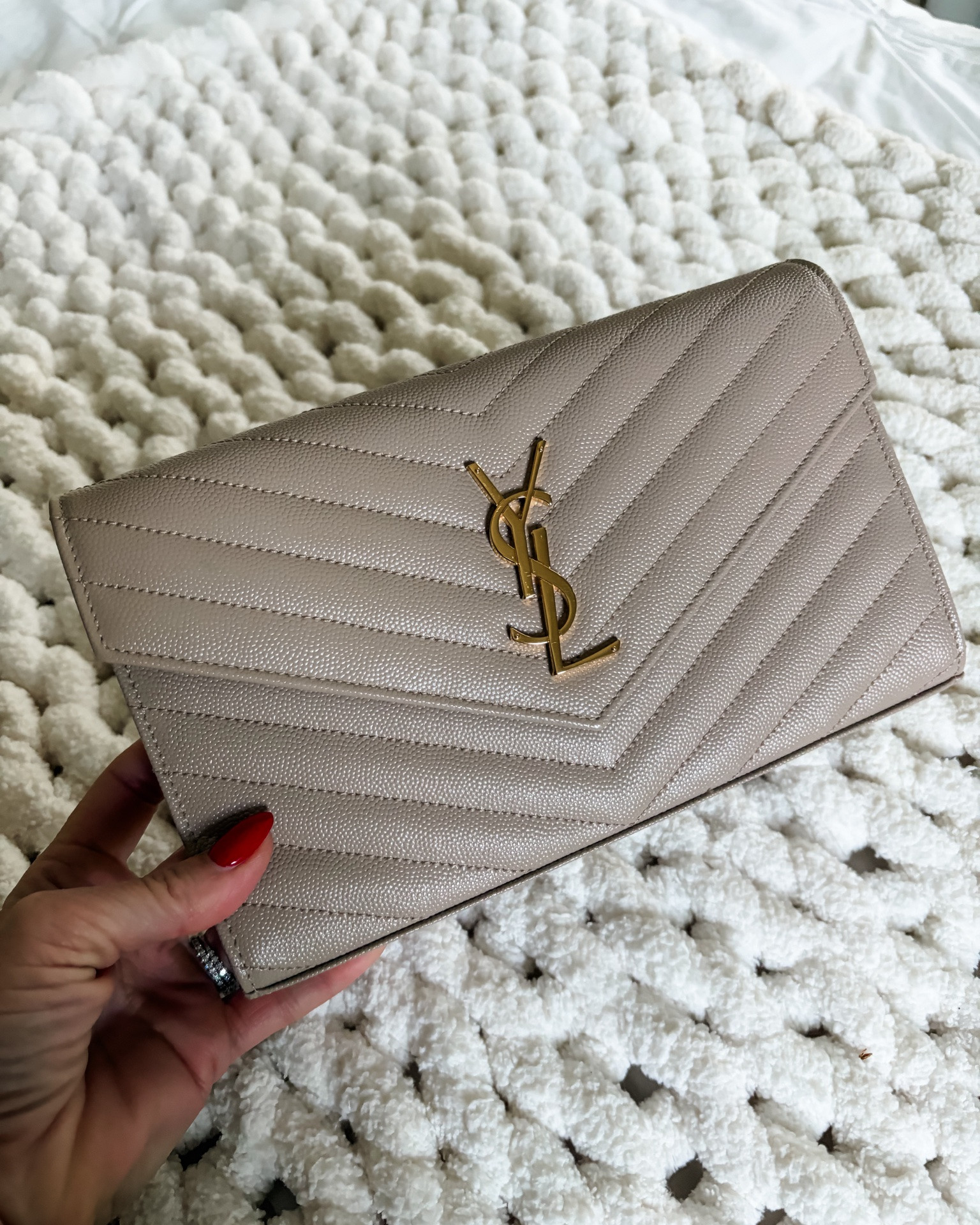 This YSL bag is on sale!  I often use it as a clutch.  It is the perfect neutral shade of beige and can hold an iPhone.

#LTKSaleAlert