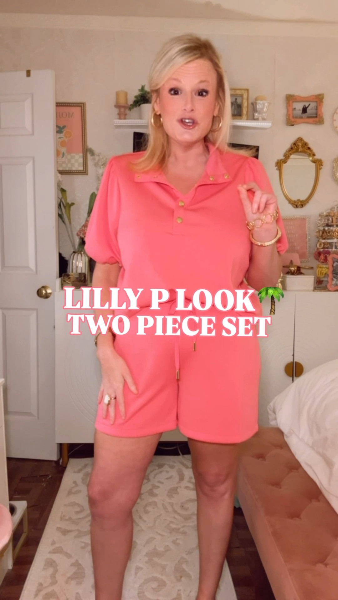 Always wanted a Lilly P two piece set? Well, I just found one that gives that look for less and it’s on major sale right now. 🌴

The poppy pink. The gold buttons. The puff sleeve. The matching short set that makes you look like you just stepped off a yacht and have absolutely nowhere to be except somewhere fabulous.

The fabric is the part nobody talks about and it is the part that sealed the deal in this home run of a find. Polyester-rayon-spandex blend that feels like a dream — that soft, substantial, slightly stretchy hand that Lilly does so well on their resort sets. This is that. Machine washable. Moves with you. Holds its shape.

The top: puff sleeves with that gathered shoulder volume that is pure Lilly DNA. Collared neckline. Gold button placket.
The shorts: elastic waistband with a drawstring tie in that same poppy pink. 5” inseam. The right amount of coverage for a resort day, a lunch, a walk, anywhere this color is going to turn heads.
Available in pink, green, and white. I am in a medium in both.

🌺 Spring travel outfit
🌺 Resort wear women
🌺 Vacation outfits beach
🌺 Spring break outfit
🌺 Matching set for brunch
🌺 Two piece set for vacation
🌺 Pink outfit that makes a statement
🌺 The Lilly look your wallet will actually allow

Lilly Pulitzer look for less, Lilly Pulitzer dupe, Lilly Pulitzer inspired set, Lilly Pulitzer two piece set look for less, preppy two piece set women, pink matching set women, pink resort set women, matching short set women, two piece set women, vacation outfits beach, spring break outfit women, resort wear women, spring outfits women, travel outfit women, travel set women, pink outfit women, spring two piece set, preppy outfit women, preppy style women, Palm Beach style women, preppy resort wear, Spanx air essentials look for less, matching set vacation outfit

#LTKFindsUnder100 #LTKFindsUnder50 #PreppyStyle #LillyPulitzer #LookForLess
#TravelSet #SpanxAirEssentials  

#LTKActive #LTKSaleAlert #LTKTravel
