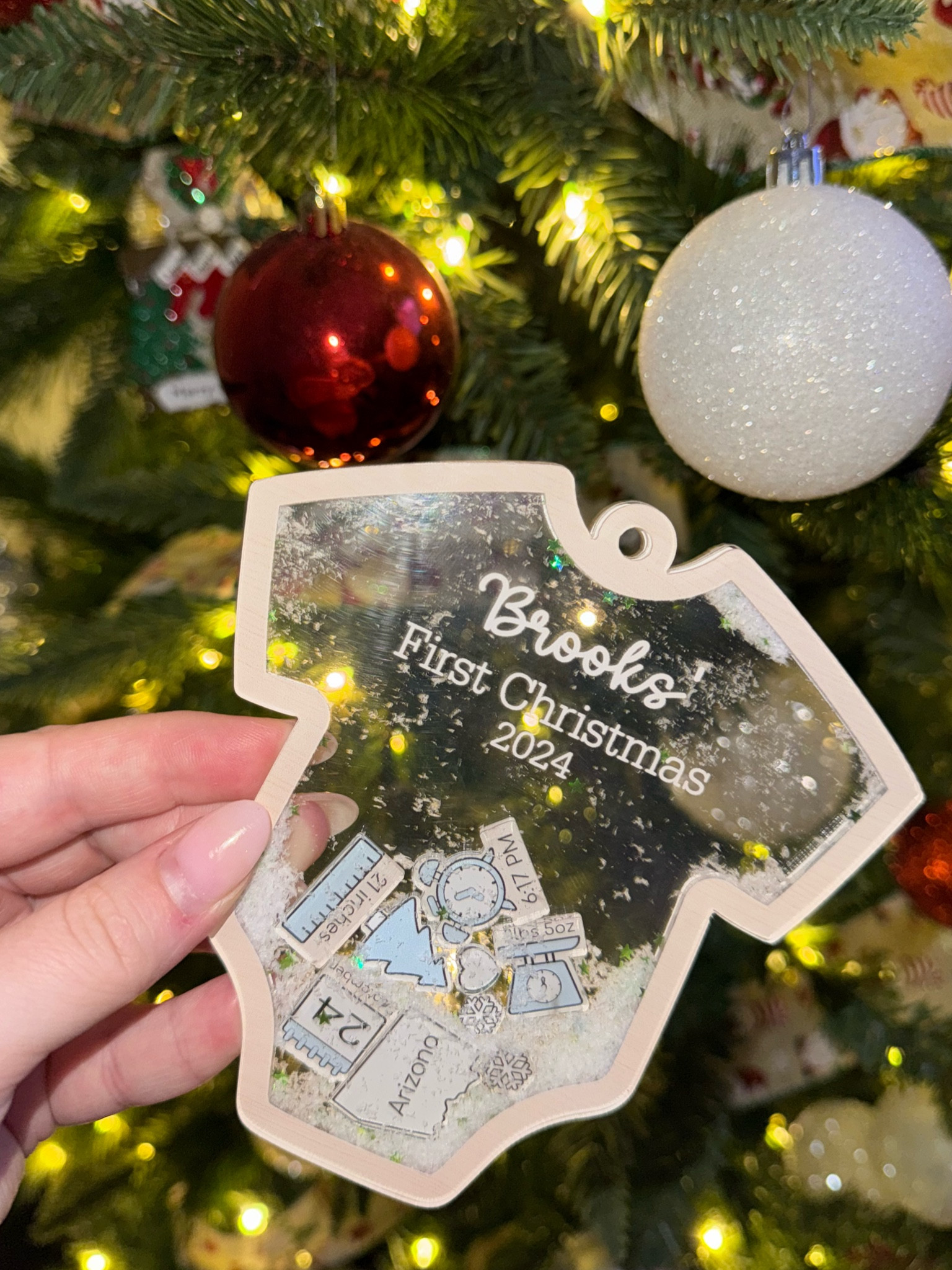 the sweetest ornament! Personalized on Amazon for a great price! What a great gift for new parents 🫶🏼🤍

#LTKBaby #LTKHoliday #LTKGiftGuide