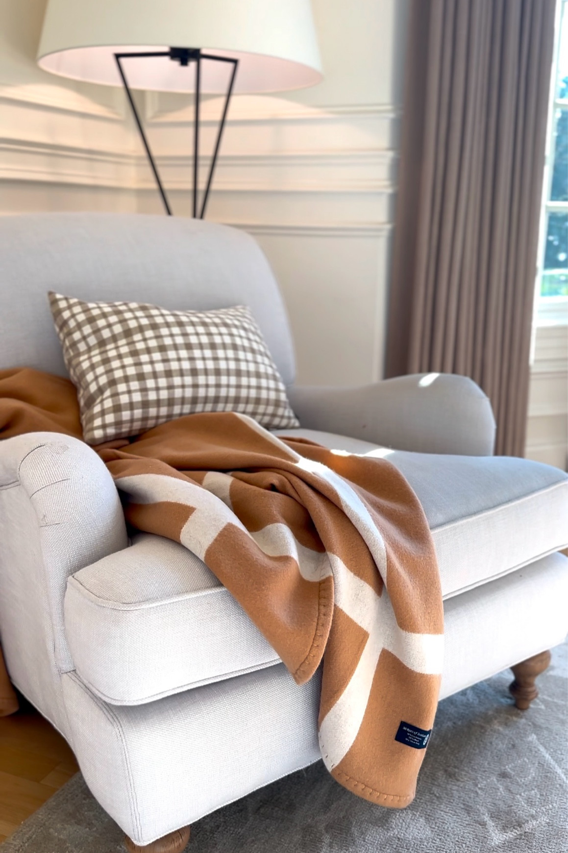 Wool throw from amazon on serena & lily miramar chair in fog 

#LTKOver40 #LTKHome