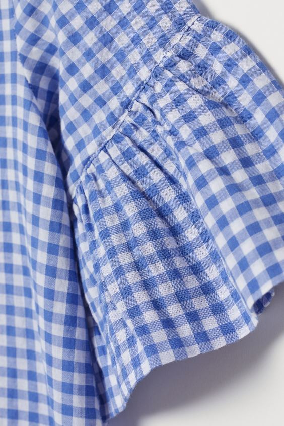 Dess in woven fabric. Small opening at back of neck with button, 3/4-length sleeves with wide ruf... | H&M (US + CA)