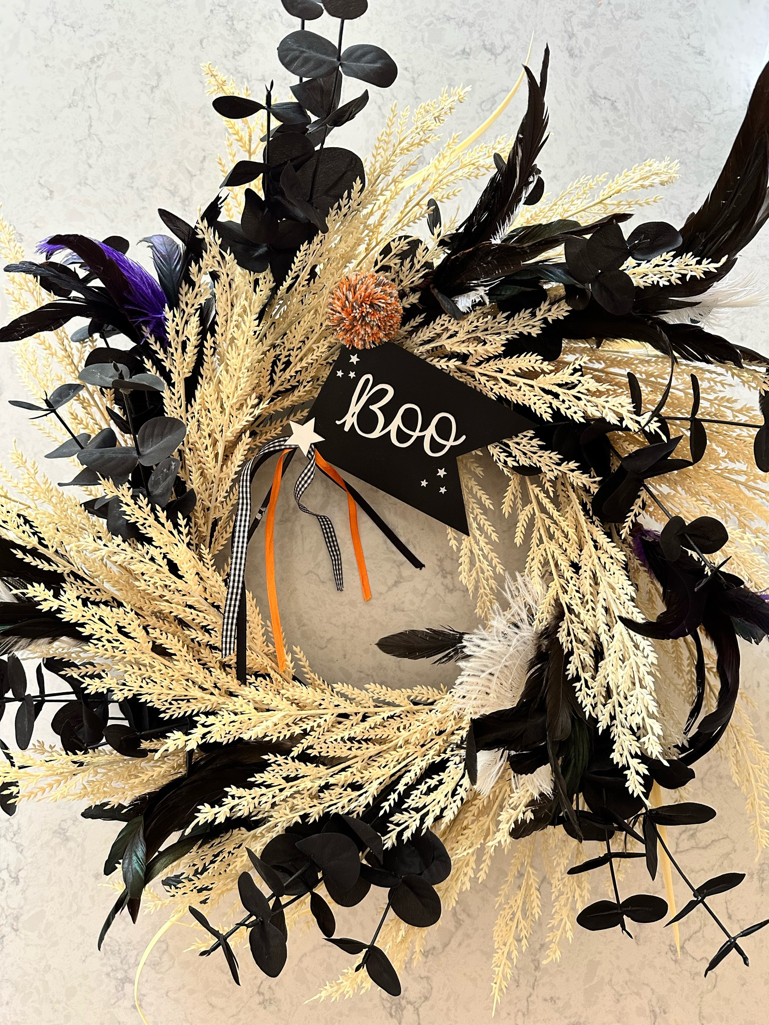 Let’s take a basic wreath and make it BOLD with some beautiful black eucalyptus, feather stems and a darling little sign! ✨

#LTKSeasonal #LTKHalloween #LTKHoliday