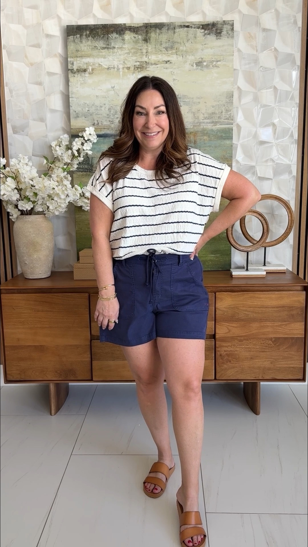 Easy, everyday casual 🤍 This striped tee + pull-on shorts combo is one of those outfits you’ll reach for on repeat. Comfy, flattering, and perfect for running errands or grabbing lunch. Paired with a neutral crossbody + slides to keep it effortless.

Sizing: top tts, L // shorts size up, 14

#LTKmomlife #LTKOver40 #LTKMidsize