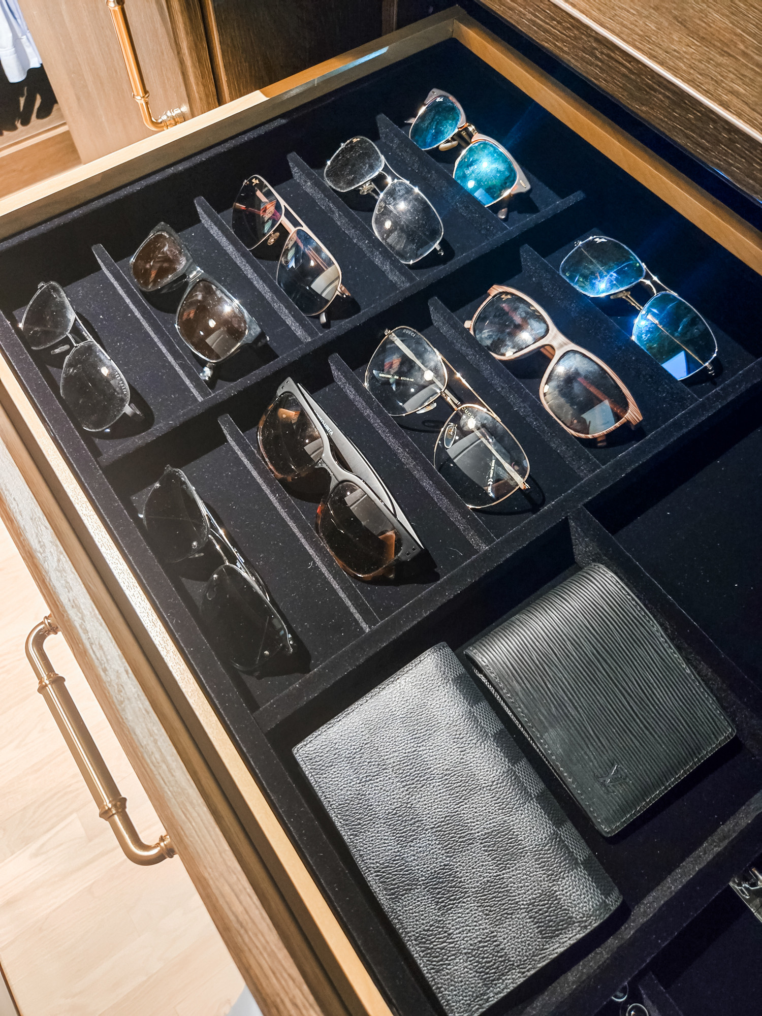 When there's lots of sun in the forecast, our client can simply slide open this drawer, choose a pair of shades, and head out! 😎 

 