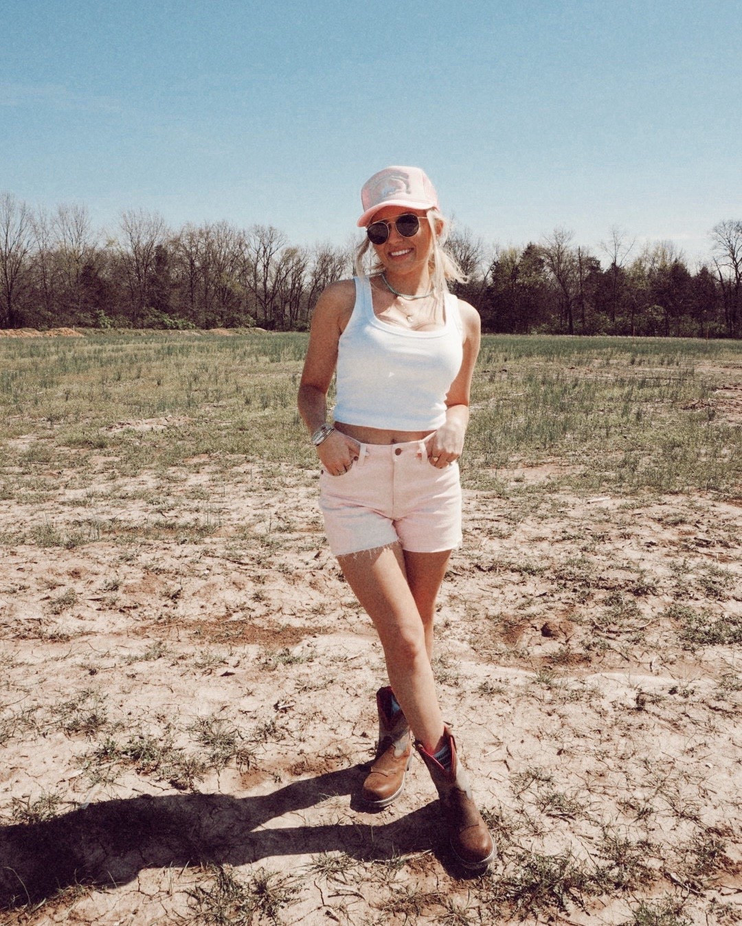 loving this summer casual ootd | these wrangler pink cowgirl shorts are so adorable! TTS! And a very good lenght / inseam! 

Also loving these cowgirl boots for farm life and everything in between! Super good price point too! They are from boot barn - lining them from Amazon!:)

cowgirl summer, western style, ootd, casual summer ootd, cowgirl style, cowboy shorts, cowgirl boots, trucker hat outfit, trucker hat ootd 

#LTKShoeCrush #LTKU #LTKStyleTip