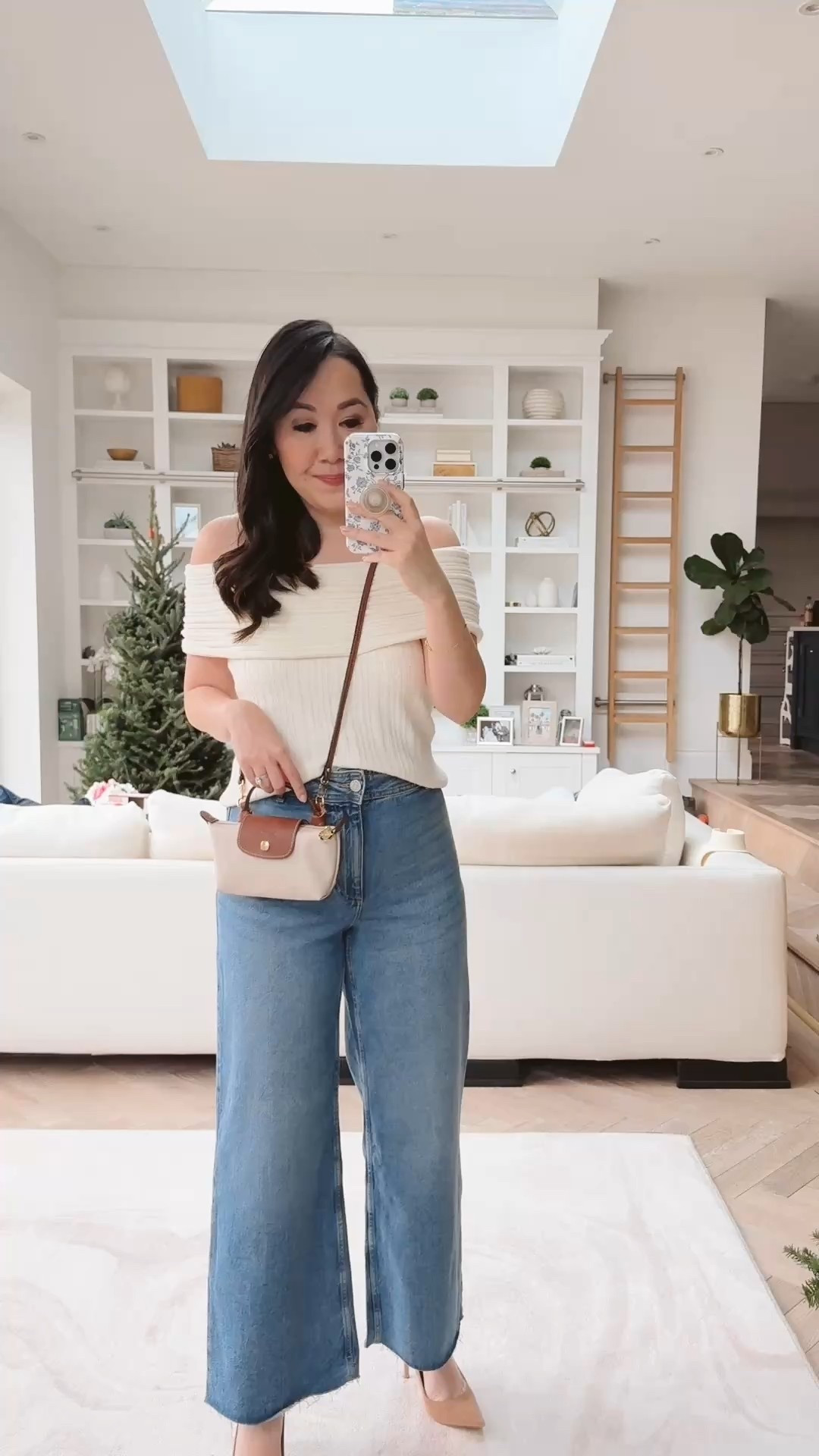 A little mod shot of the Longchamp mini pouch with strap! 