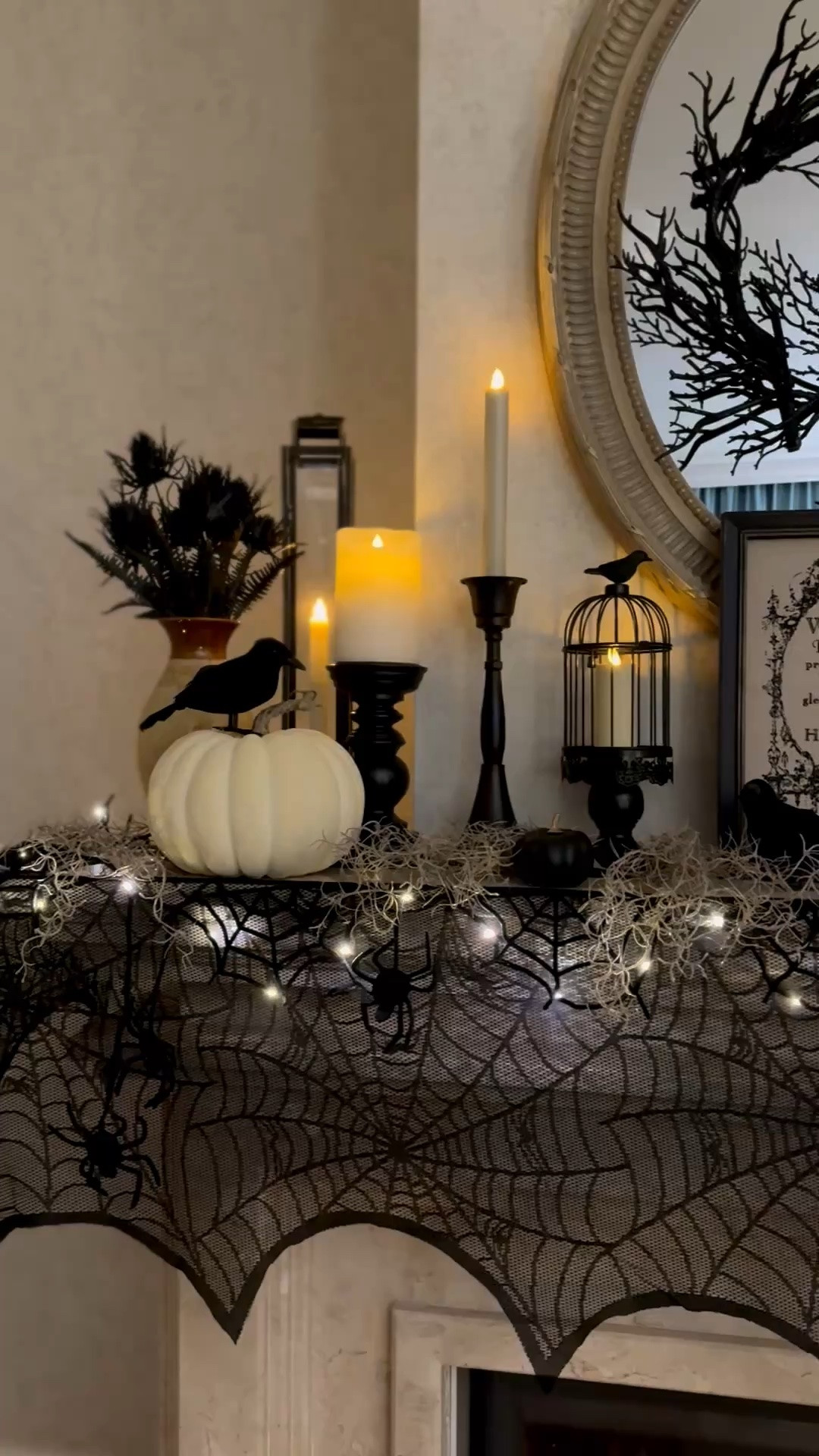 Halloween home decor, Halloween living room mantel, black skull candle, decorative crows