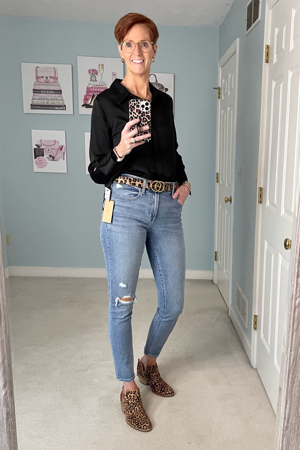 Black satin shirt with distressed jeans. A classic outfit for day or going out at night.

Satin shirt, black shirt, jeans, distressed jeans, classic outfit, fall outfit, booties

#LTKstyletip