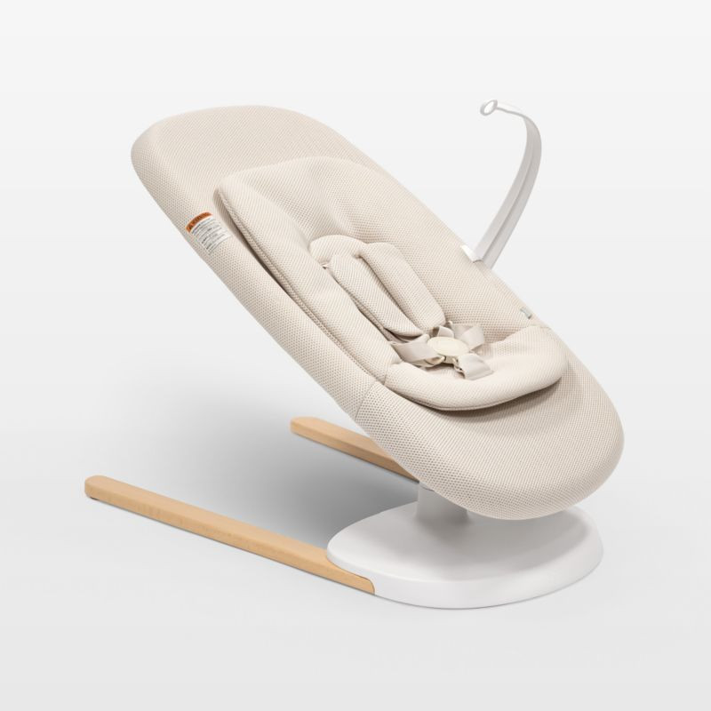 Stokke® Light Sand Yoga Baby Bouncer Chair | Crate & Barrel