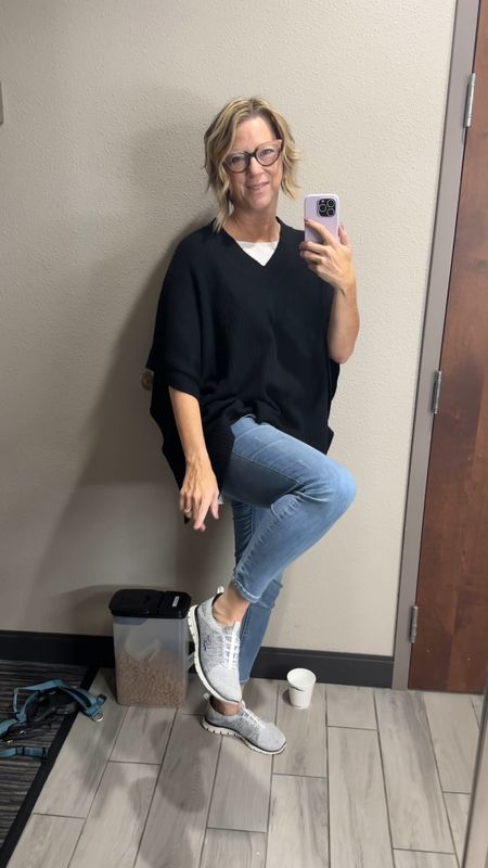 Travel outfit with a comfortable shoe that is easy to slip off and slide on in airport security. Size is tts. Wearing a large in long tunic shirt and poncho comes in several colors. #traveloutfit 

#LTKtravel #LTKshoecrush #LTKSeasonal