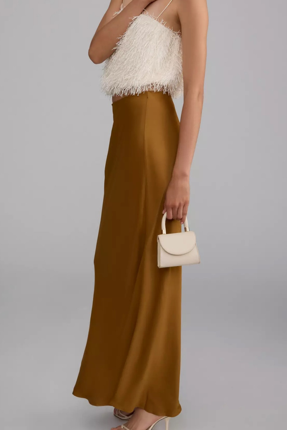 Maxi Skirts…..have a sneaking suspicion they’ll be all over the place come fall!   The perfect dress up or down item for your closet….just snagged this one! 