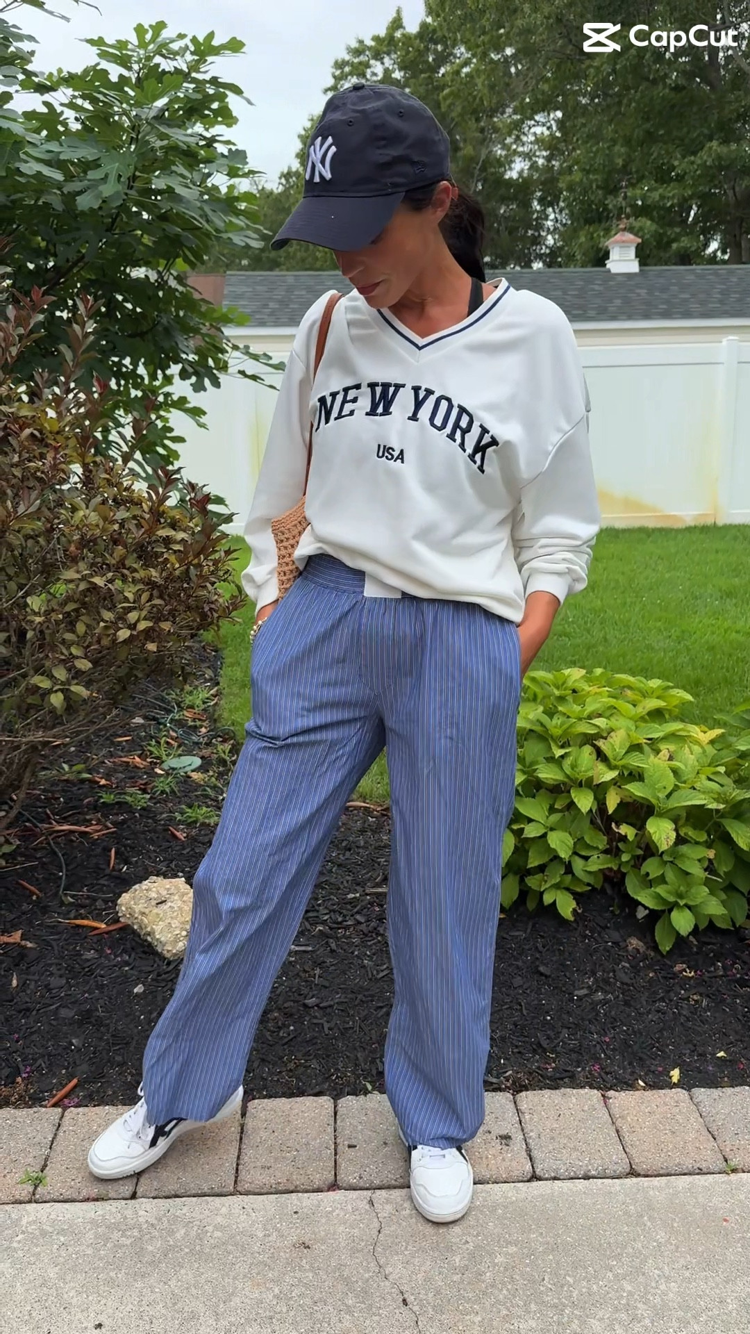“NY state of mind but make it cozy 🗽✨ Oversized New York sweatshirt + wide leg navy stripe pants = my new uniform for chilling in style. Who says loungewear can’t look this good? 💙🤍”

#newyorkstyle #loungewearlove #widelegpants #cozychic #ootd