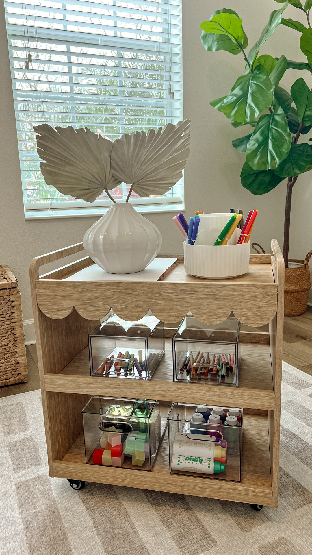 Okay, this might be one of my favorite kid organization finds 🤍

This rolling art cart is under $70, but the scalloped detail gives it such a high-end feel. It’s simple, functional, and actually gets used — which feels rare.

I love that it keeps everything contained, rolls wherever we need it, and looks good enough to leave out.

This rolling cart is perfect as: • a kids art station • a homework organization cart • toy and craft storage • a baby essentials or diaper station

Honestly… so many uses.

#kidorganization #aestheticmom #playroominspo #functionalhome #modernmomlife

#LTKKids #LTKmomlife #LTKBaby