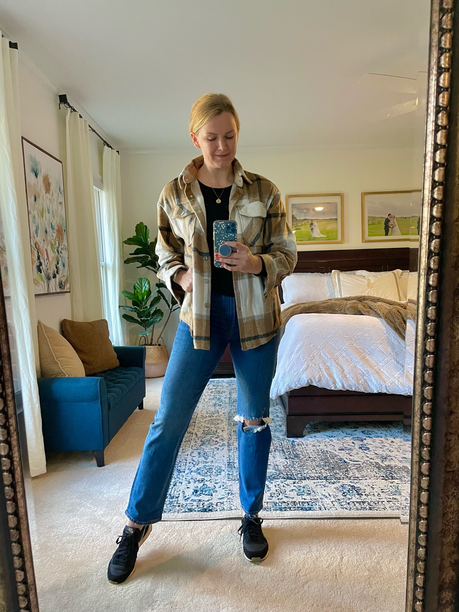 Shirt Jacket / Shacket - brown, white & black plaid. This one is a lighter weight. Would be great for more southern climates this winter. Fits true to size. On sale for $35

Soft, ribbed layering tee underneath in my normal size.

High waisted straight leg jeans with cut out knee. Fit true to size but a little snug. 30% off for Black Friday!

Nike sneakers

Fall or winter look, casual Thanksgiving week outfit, weekend outfit

#LTKSeasonal #LTKunder50 #LTKCyberweek