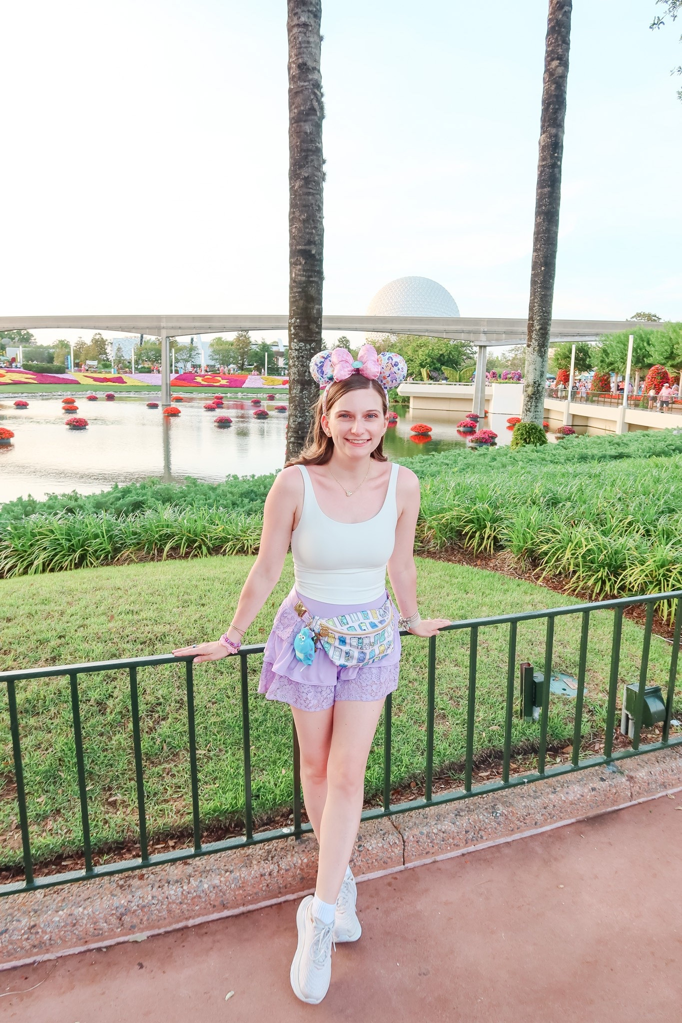 •Disney mom outfit inspo 💜 One thing I learned on my recent Disney trip with a 10 month old, active wear is key 😅 Skirt is sold out sadly, but this is my new favorite workout top! + it is super affordable. Comment SHOP to get the link 💜•