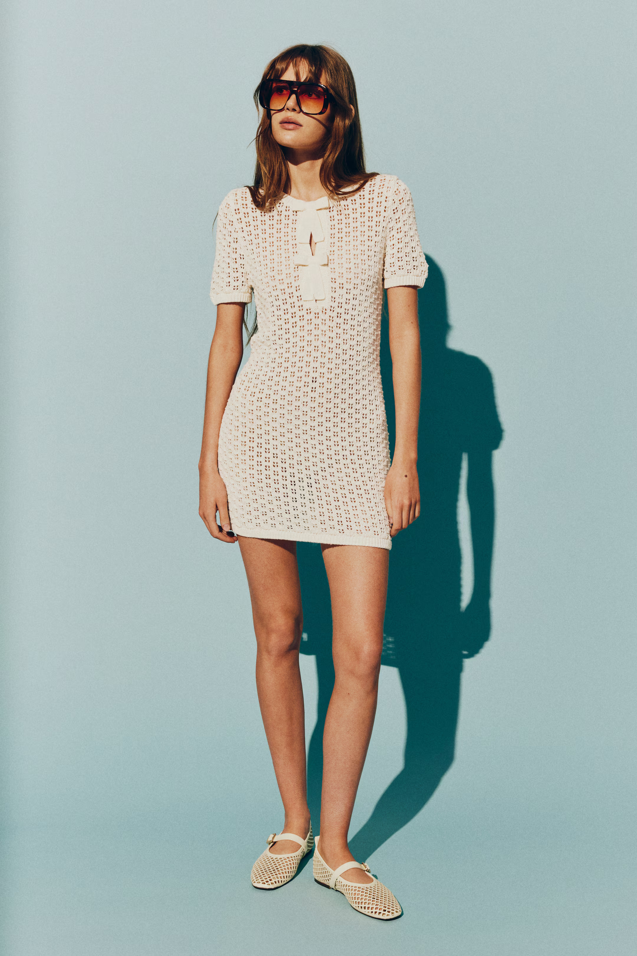 Bow-detail pointelle-knit dress | H&M (UK, MY, IN, SG, PH, TW, HK)