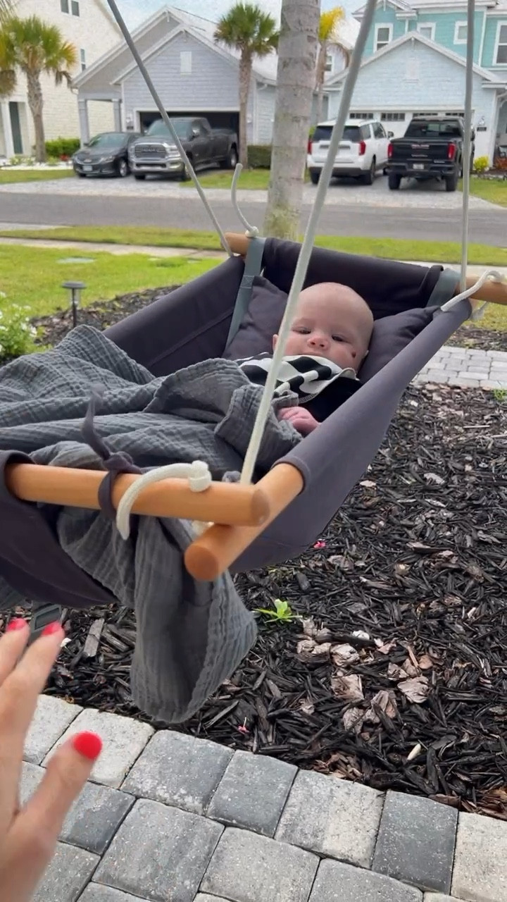 our favorite swing!! easy to hang up & the actual cloth part can be taken off so the rain doesn’t ruin it. it can be assembled multiple ways to grow with the babe from infant to toddler. 30% off right now for only $69.99!! one of the best purchases! 🩶 

#LTKfamily #LTKSpringSale #LTKkids