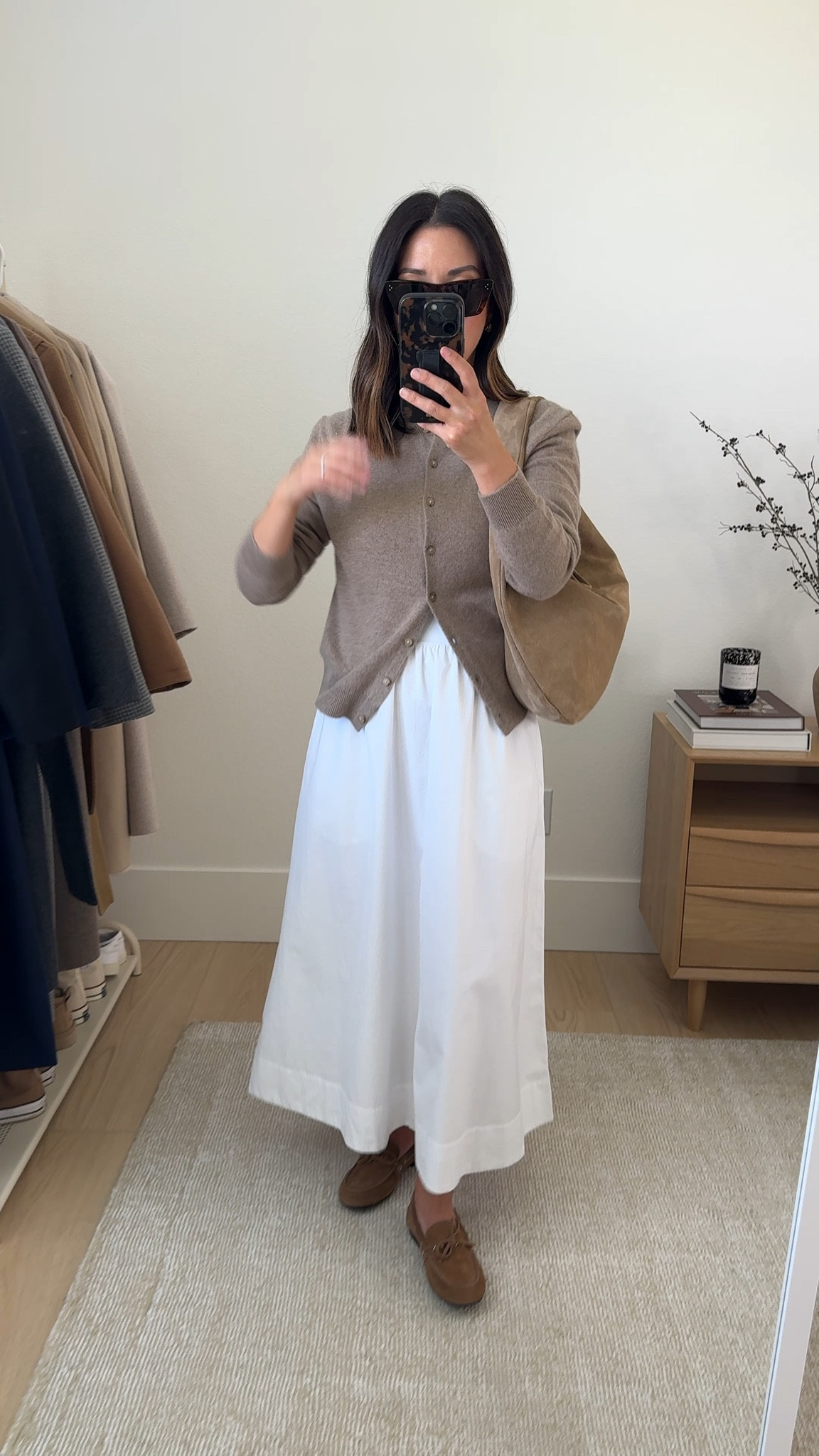 Transitional summer to fall outfit ideas. How to do transitional style. a white skirt is a great way to transition your summer pieces into fall. I'm wearing a dress here, but wearing it as a skirt.  This cashmere sweater is incredible!

Aritzia sweater small
Aritzia dress small
Everlane loafers 5.5
Flattered Alva bag
Celine sunglasses
Dorsey James necklace 15"
J.Crew earrings

#LTKItBag #LTKPetite #LTKStyleTip