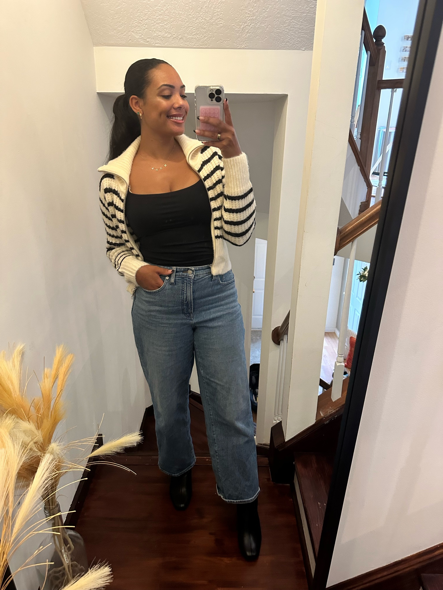 The perfect fall outfit! This striped cardigan is so comfy and cozy. These wide leg jeans, paired with black boots are also a fall must  

#LTKstyletip #LTKshoecrush #LTKxMadewell