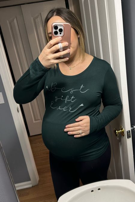 Under $20 maternity long sleeve tee. Best gift ever. So soft and comfy! Wearing a large, in 3rd trimester. Buy online, pick up in store  Also wearing a large in faux leather maternity leggings by Ingrid & Isabel. Don't fall down! No sagging. Amazing. 

#LTKbump #LTKsalealert #LTKHoliday